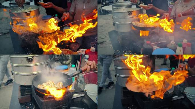 火在平底锅周围呼啸而过-街头食品场景2个镜头