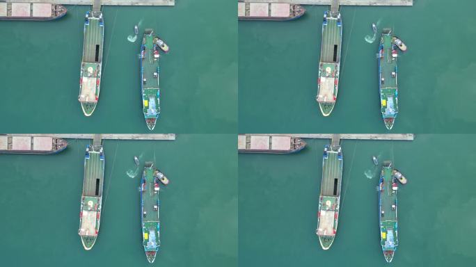 拖船随船进货港。国际港口和国际海运的滚装船鸟瞰图。