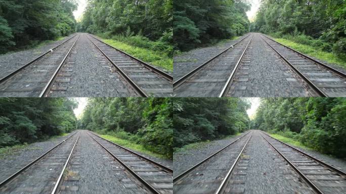 废弃铁轨航拍镜头(4k 30fps)从上方拍摄，向前飞行，向后(杂草丛生的铁轨，领带，路权)骑行
