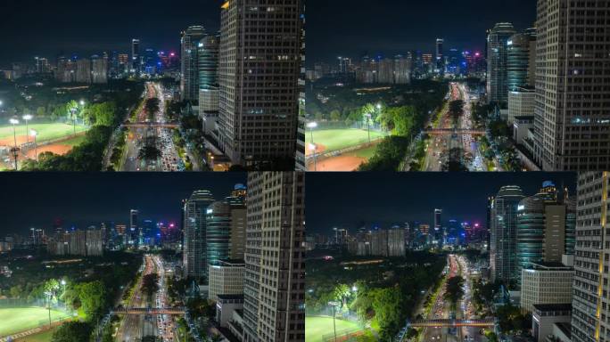 雅加达市夜间照明市中心交通街道道路工作体育场航拍全景4k延时印尼