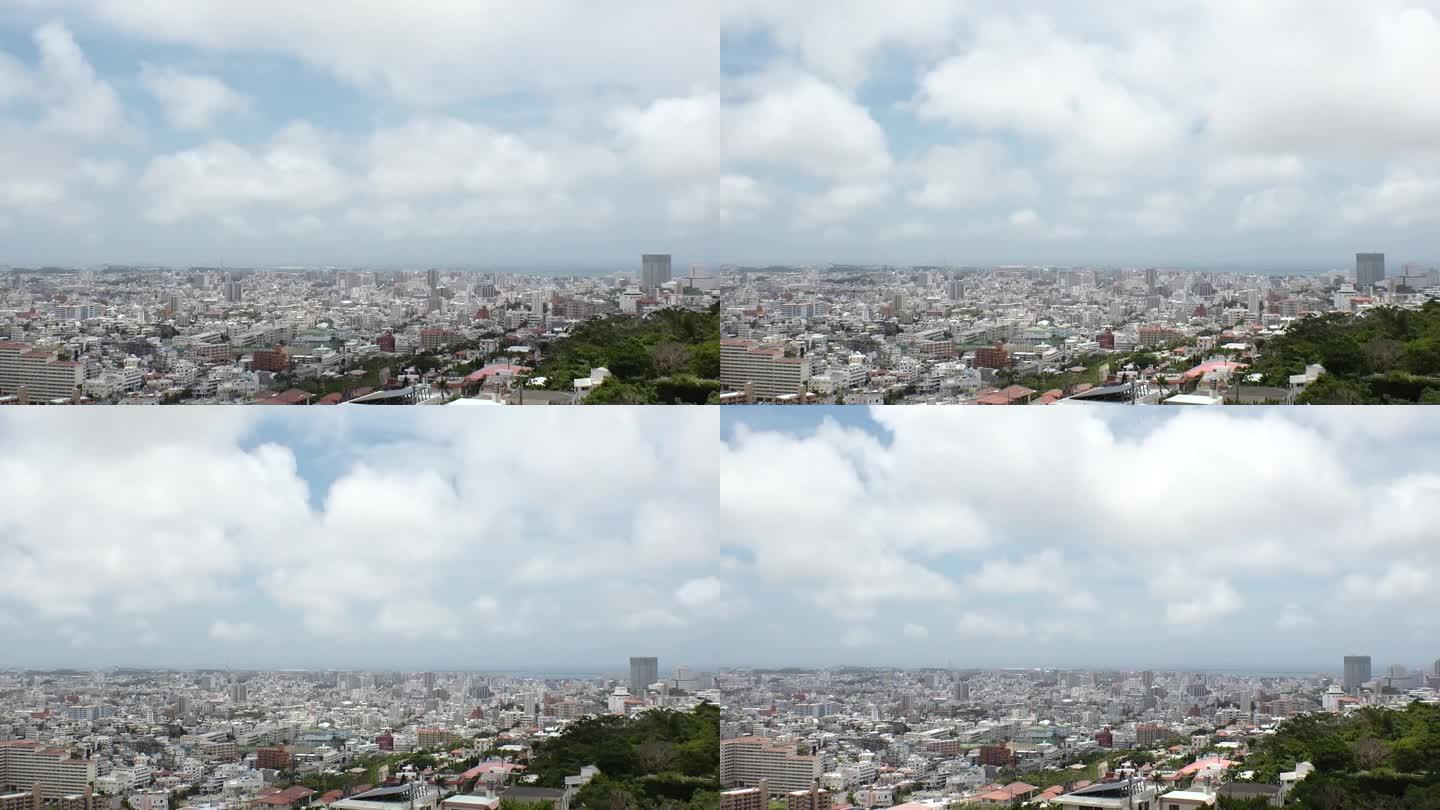 日本，冲绳，那霸:白天鸟瞰那霸市。延时拍摄。