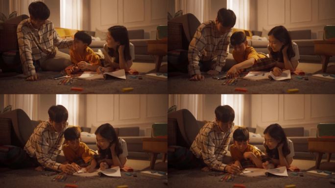 幸福的韩国家庭:可爱的小男孩在地板上用笔记本画画，并把他的画展示给慈爱和支持的父母。骄傲的父母微笑着