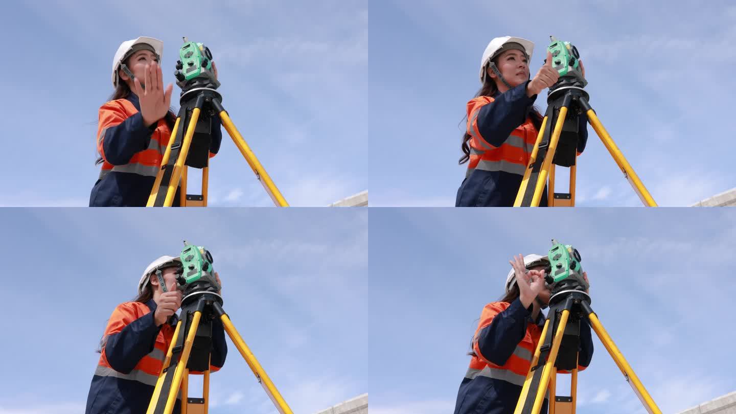 女工程师使用经纬仪设备进行路线测量，在十字路口搭建桥梁，以减少高峰时段的交通拥堵。