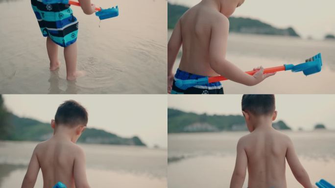 快乐的亚洲男孩在沙滩上玩铲子玩具。在漫长的周末，一个快乐的男孩在海滩上享受时光。