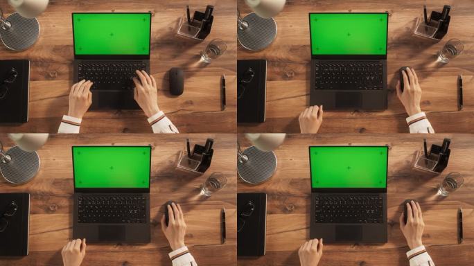 匿名办公室工作人员在笔记本电脑上打字模拟绿屏Chromakey显示与运动跟踪占位符。通过电子邮件与业