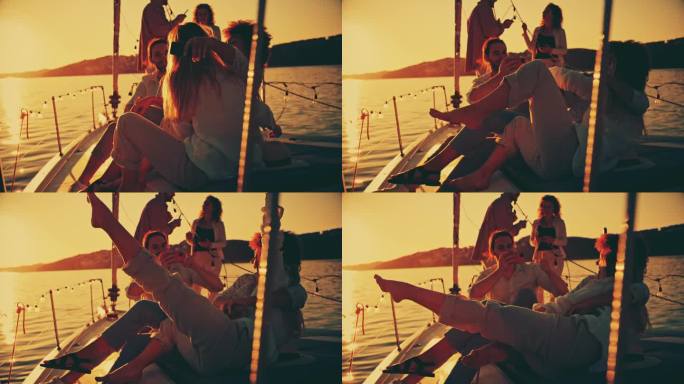 一名男子在游艇派对上拍摄两位女性朋友相互拥抱的照片