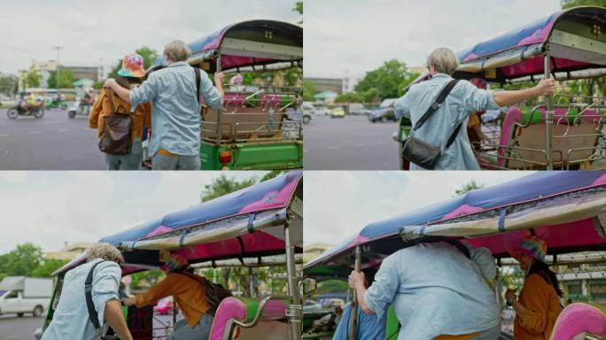 年轻夫妇在曼谷第一次骑嘟嘟车时兴奋不已。