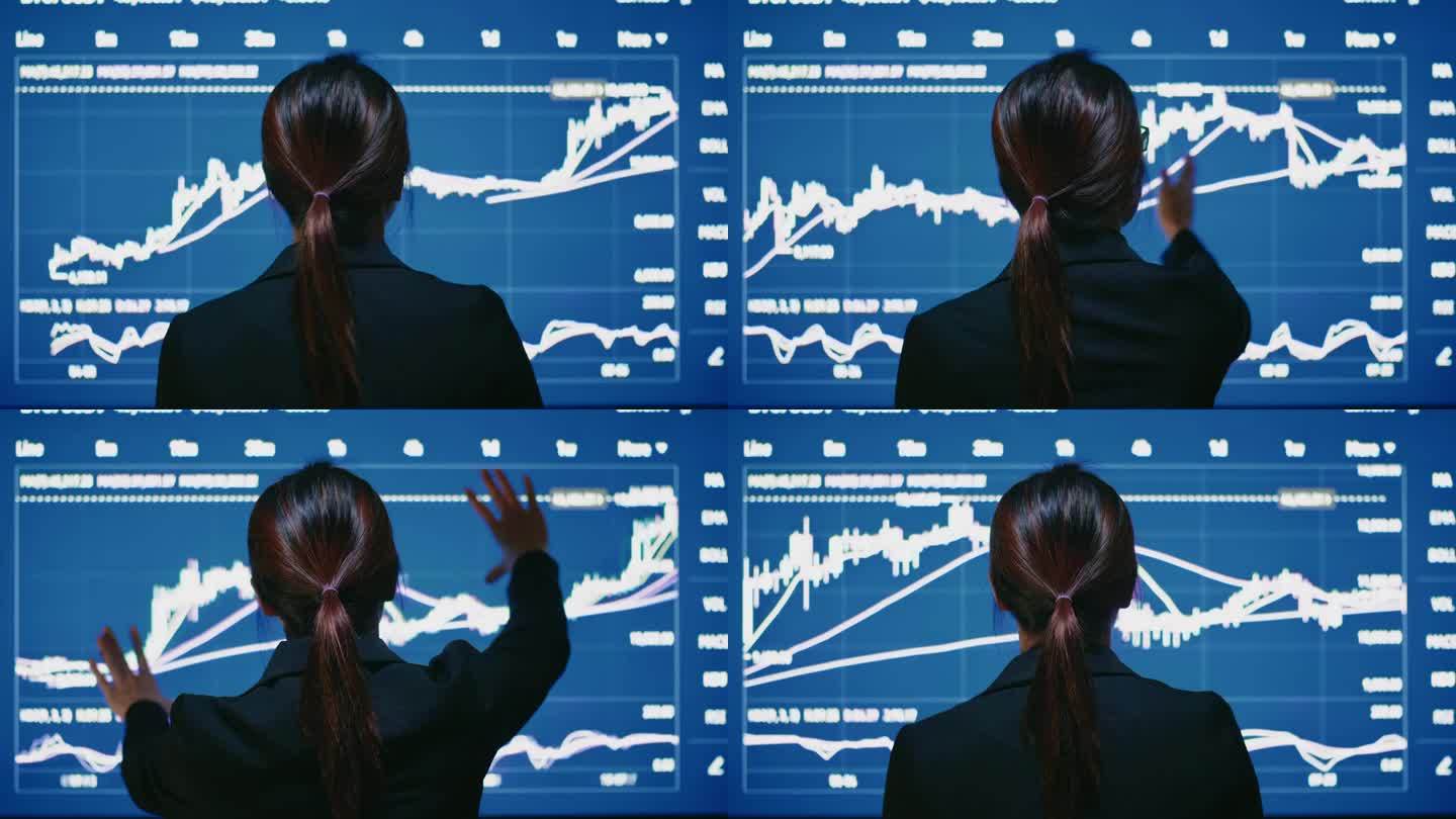 女商人看着踏屏股票市场金融屏