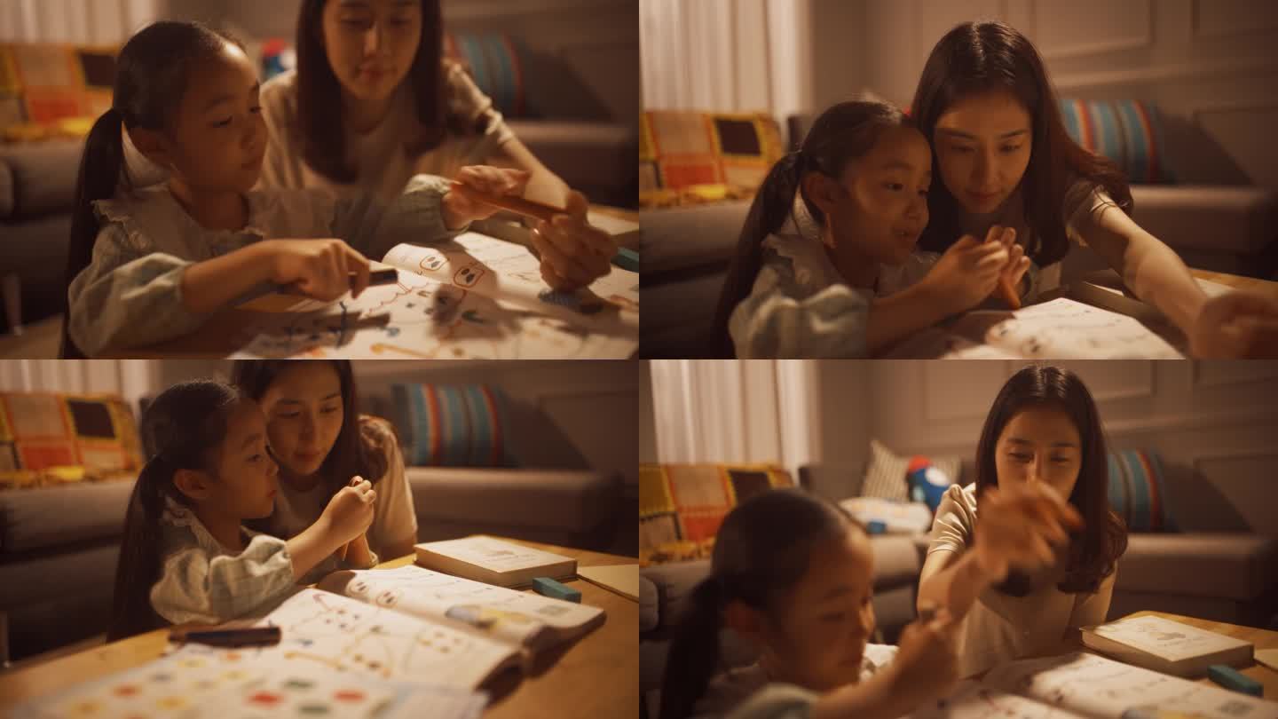 一位韩国母亲和她可爱的女儿在家里的客厅里共度夜晚的肖像。小孩子学习如何画画，与她的父母，使用着色书