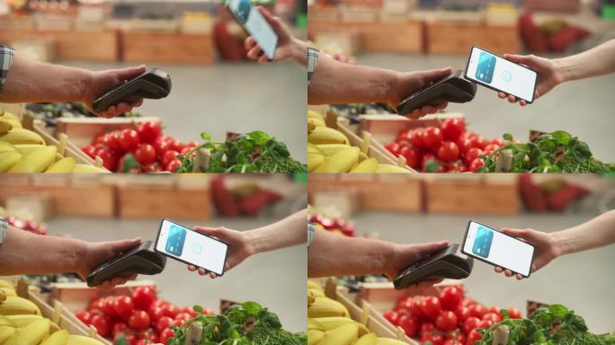 数字银行概念:消费者在农贸市场使用带有非接触式支付技术的手机支付天然商品。手持电子在线支付设备的街头