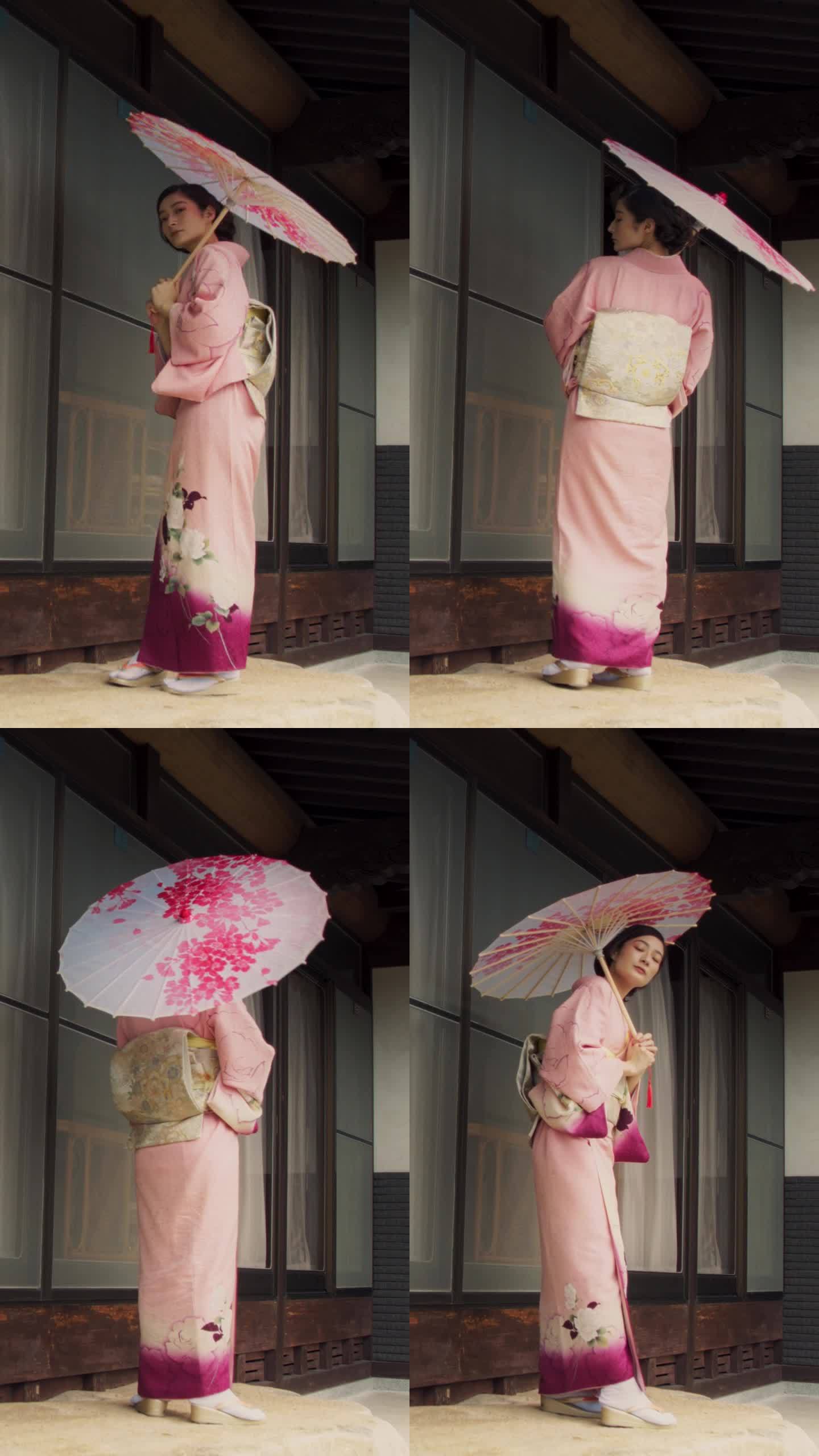 竖屏:日本女性看着镜头，温柔地微笑着，穿着传统的粉红色和服，带着花的装饰品，拿着伞。年轻美丽的女人在