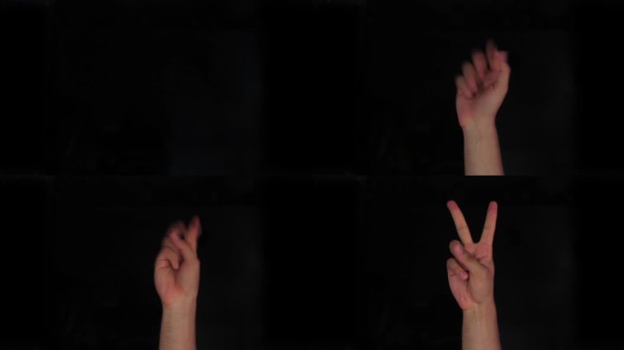 V V字母美国手语高清视频演示，美国手语(ASL)单手V V字母手语孤立在黑色背景。