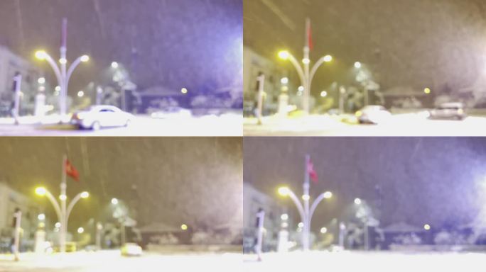 飘忽不定的降雪，街道上的交通和散景灯