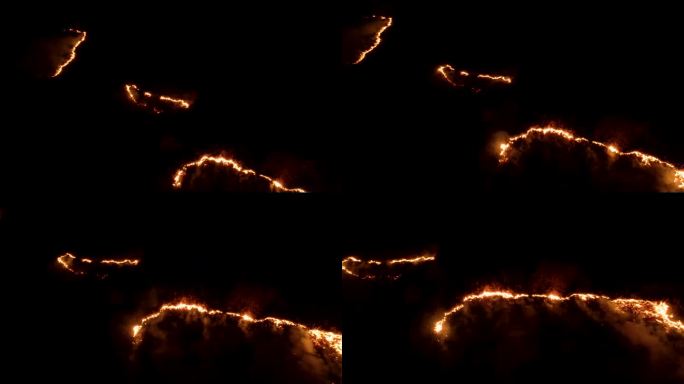 夜火在森林里有火和烟。史诗级的航拍视频，一团冒着烟的火焰。火:夜间燃烧的、发光的火森林火灾。干草在燃