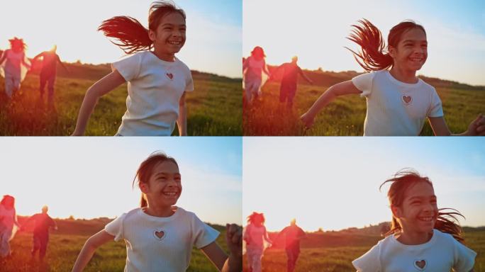 小女孩在草地上微笑着奔跑，她的父母跟在她后面跑