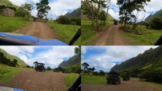 驾驶越野车穿越夏威夷侏罗纪公园。开车穿过泥土。侏罗纪世界的美丽风景。岛上有巨大的绿色山脉，有很多绿色