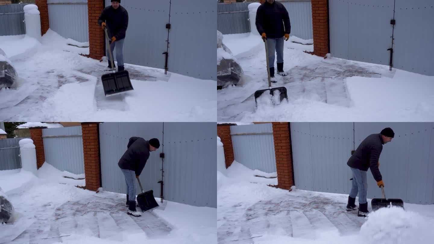 一个男人用铁铲铲雪。