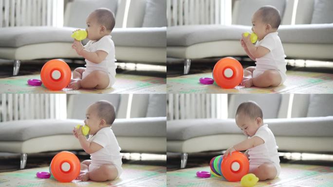 8 Month old baby boy happy and funny playing with 