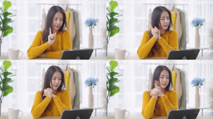 POV年轻的亚洲女性在网上对着镜头谈论工作