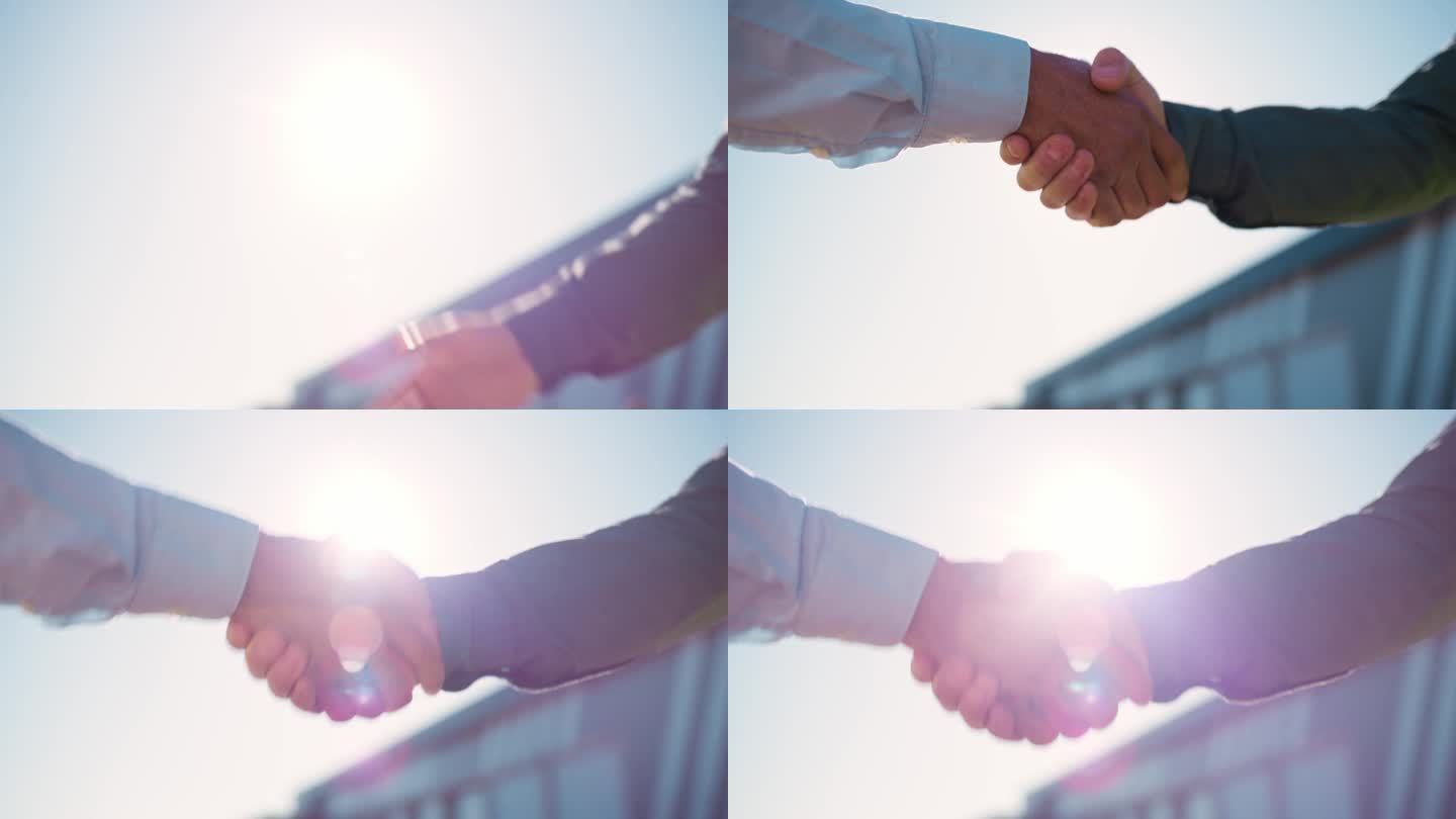 商务人士在户外开会、交易或达成协议时，在城市中握手和合作。在b2b、协作或团队团结中，男性在介绍、问