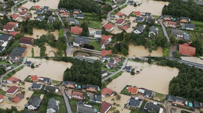 鸟瞰被淹的房屋和正在救人的救援车辆