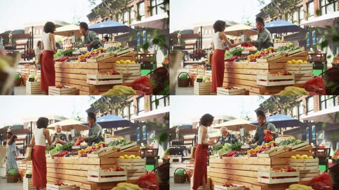 年轻漂亮的顾客在买新鲜的有机蔬菜来做番茄和黄瓜沙拉。一位黑人女性从一位快乐的女街头小贩那里购买当地生