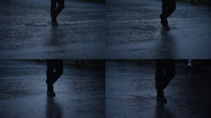 一个人在雨中行走的特写