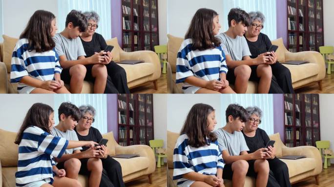 孙子在家里教祖母如何用智能手机上网