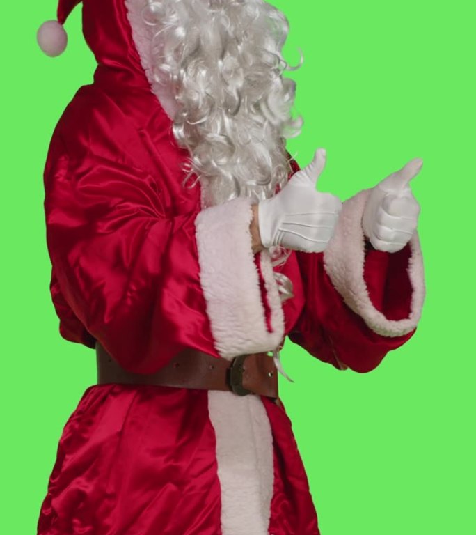 垂直视频圣诞老人竖大拇指的侧视图