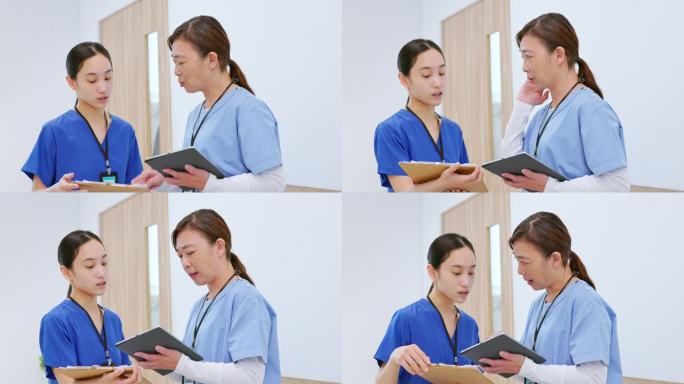 两个护士在讨论医院护士护工交流讨论