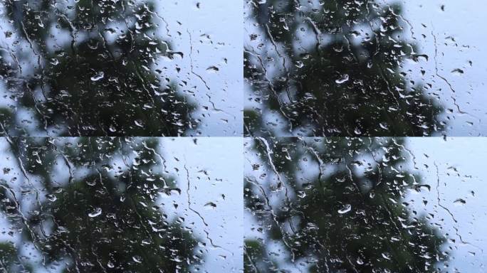水滴落在玻璃上。一滴雨。