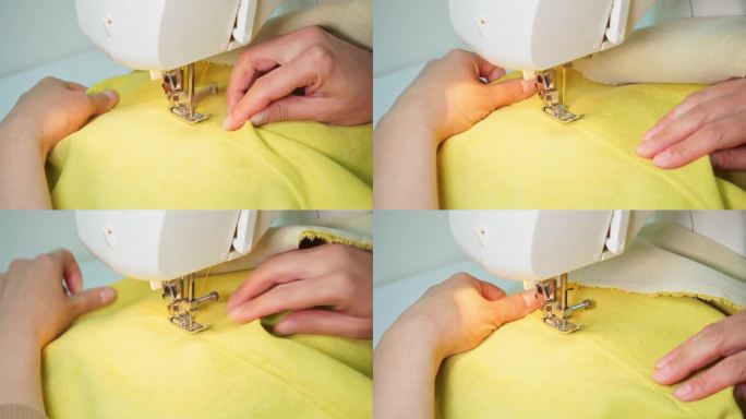 女裁缝在黄色布料上缝缝。对现代缝纫机的缝纫过程进行近距离观察