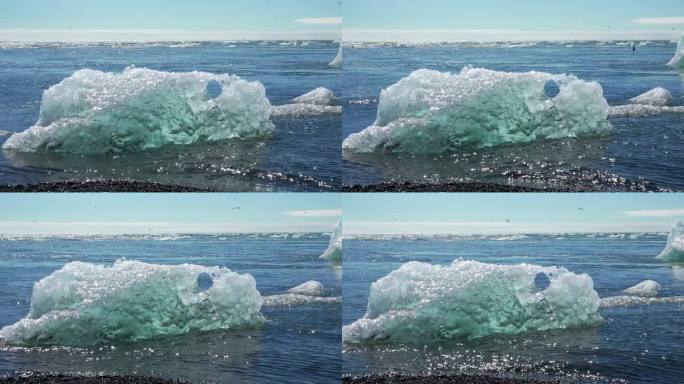 全球变暖和气候变化。冰岛冰川融化。蓝绿色的海湾融化了冰山。巨大的冰川在极地自然环境。北极冬季景观在全