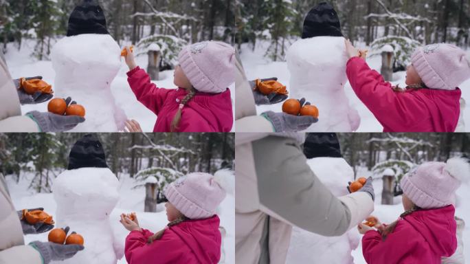 女孩把鼻子贴在雪人上。