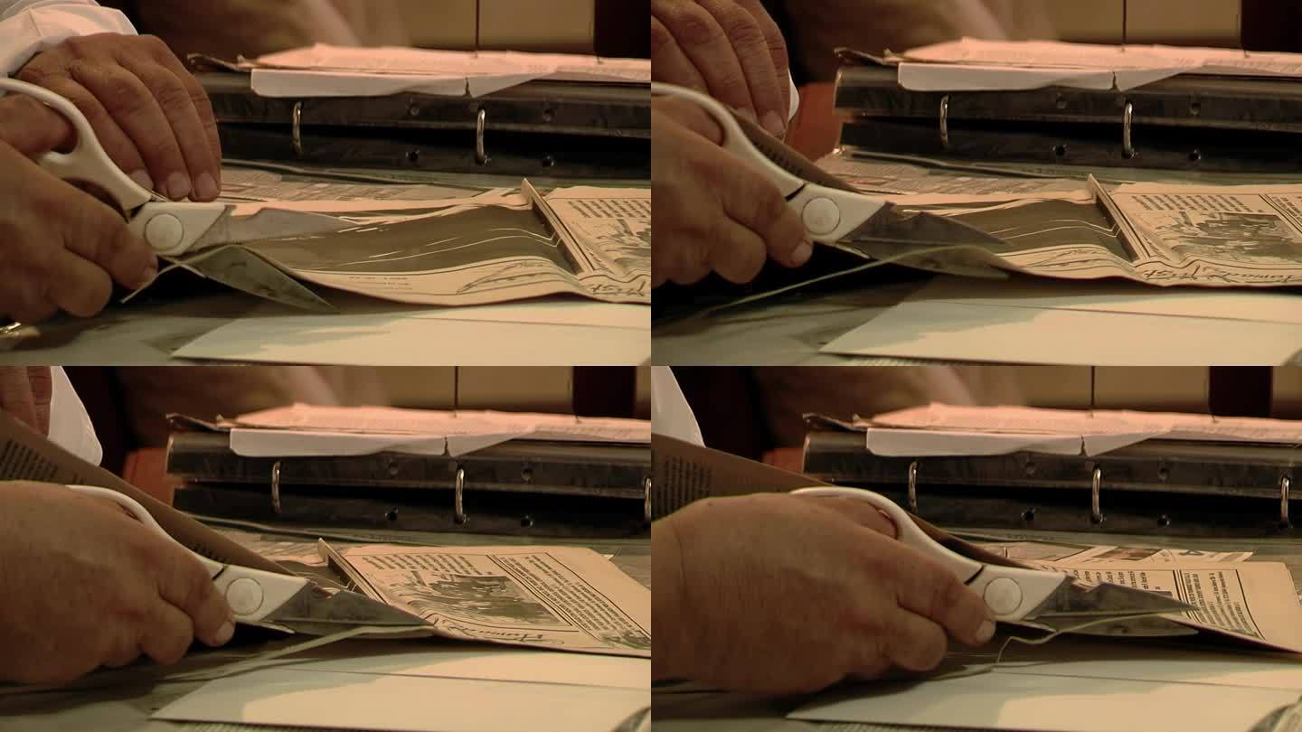在阿根廷科连特斯省的家中，一名男子在档案夹上整理“Chamame”民间音乐的文章。特写镜头。