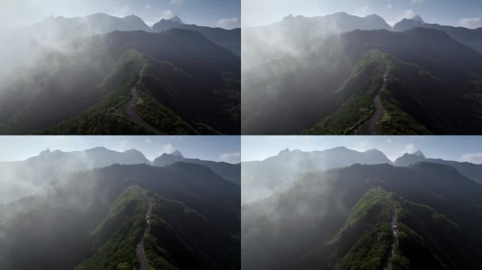 鸟瞰山坡上的道路，山的最高点在完全被森林覆盖的山脉中是美丽的，克卢德火山和蓝色的火山口，克卢德火山，