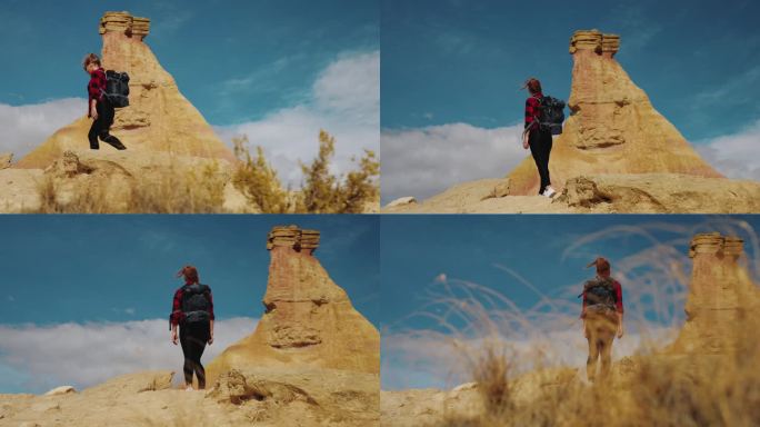 在摩洛哥欣赏砂岩岩层的女游客