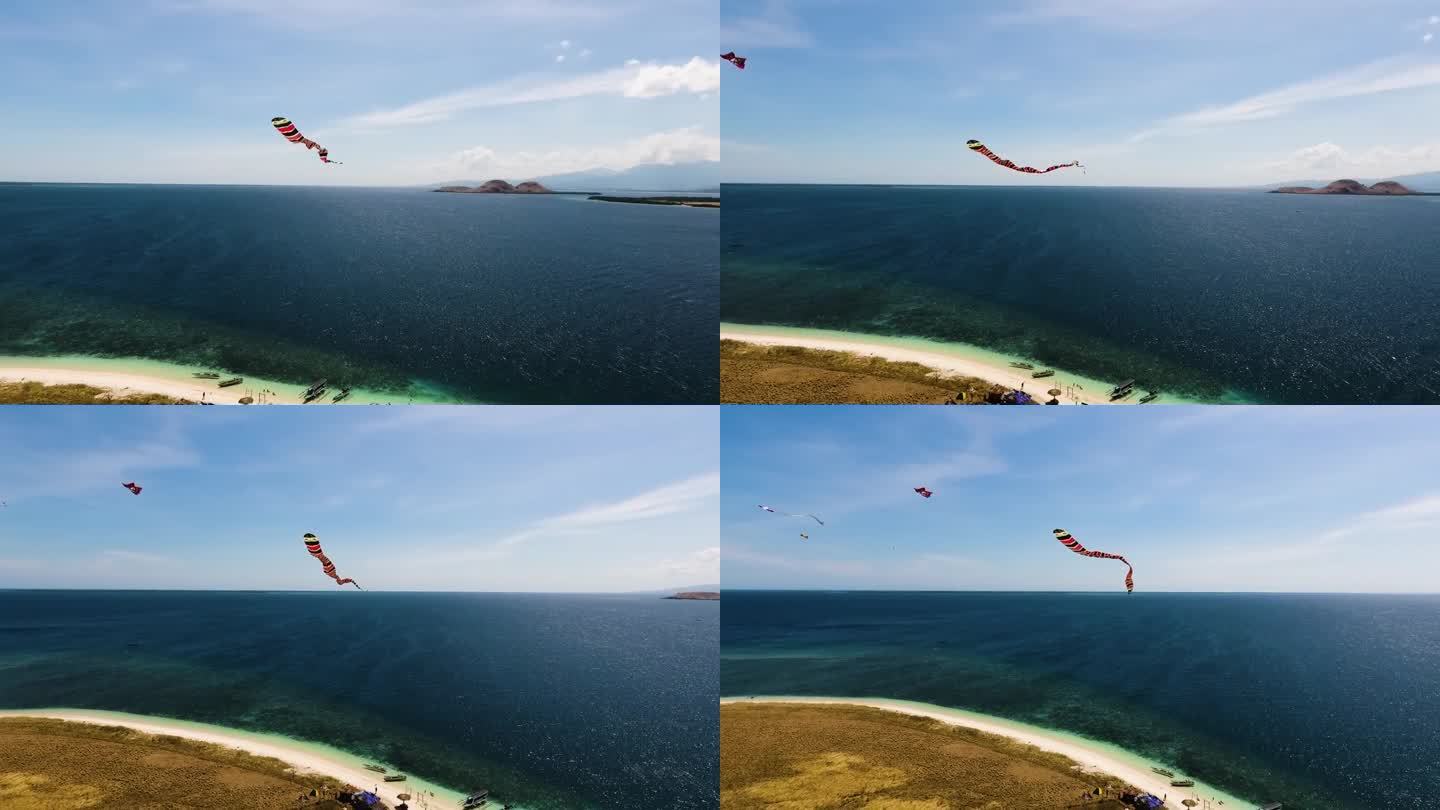 在印度尼西亚松巴哇的基纳瓦岛，美丽的野生自然景观群岛上，无人机接近风筝飞过一个热带岛屿，白色的沙滩孤