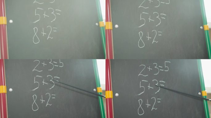 老师在教室的黑板上展示数学任务