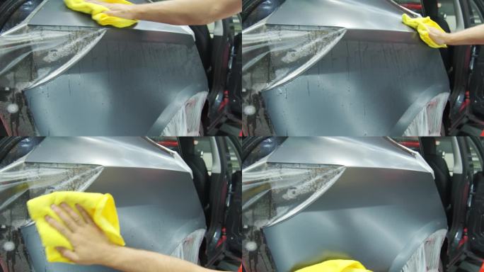 将PPF保护膜涂在汽车上的过程。给新车涂保护膜。