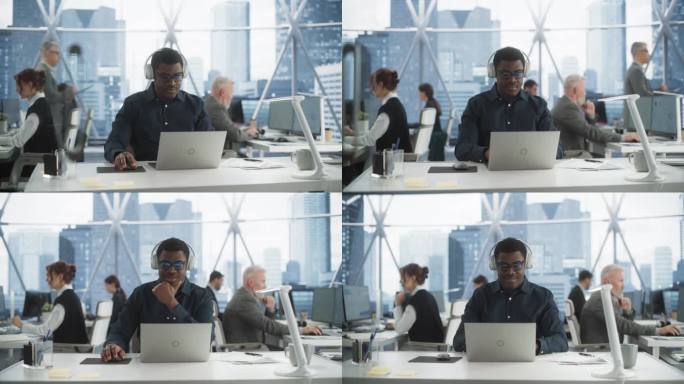 在市中心摩天大楼的办公室里，一个成功的黑人戴上耳机，开始在笔记本电脑上打字。专业的男性产品经理在多样
