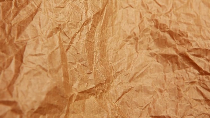 旧纸背景视频黄色牛皮纸褶皱特写包装纸