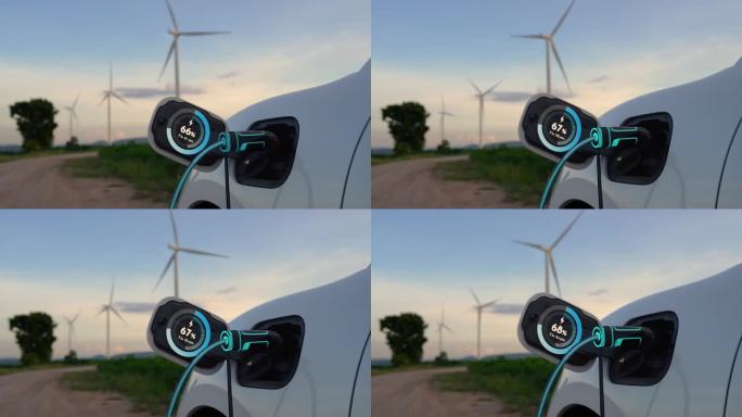 电动汽车从风力涡轮机农场的充电站充电。细读