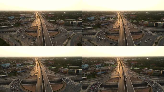 城市中的高速公路交汇处，鸟瞰图，高角度视图，日落时曼谷圆圈的俯视图
