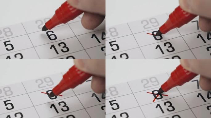 在日历上，6这个数字用红色记号笔醒目地划掉了。