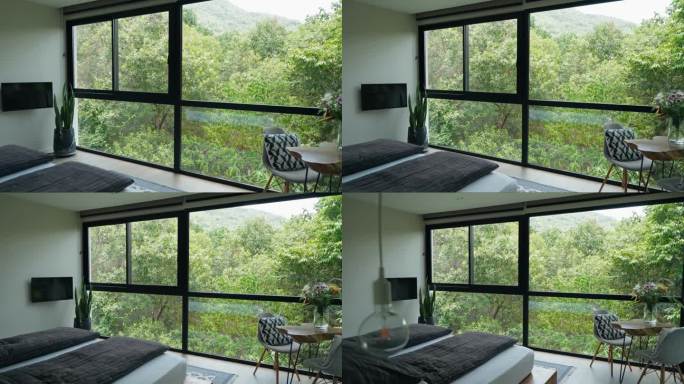 豪华别墅的卧室，可以看到丛林景观