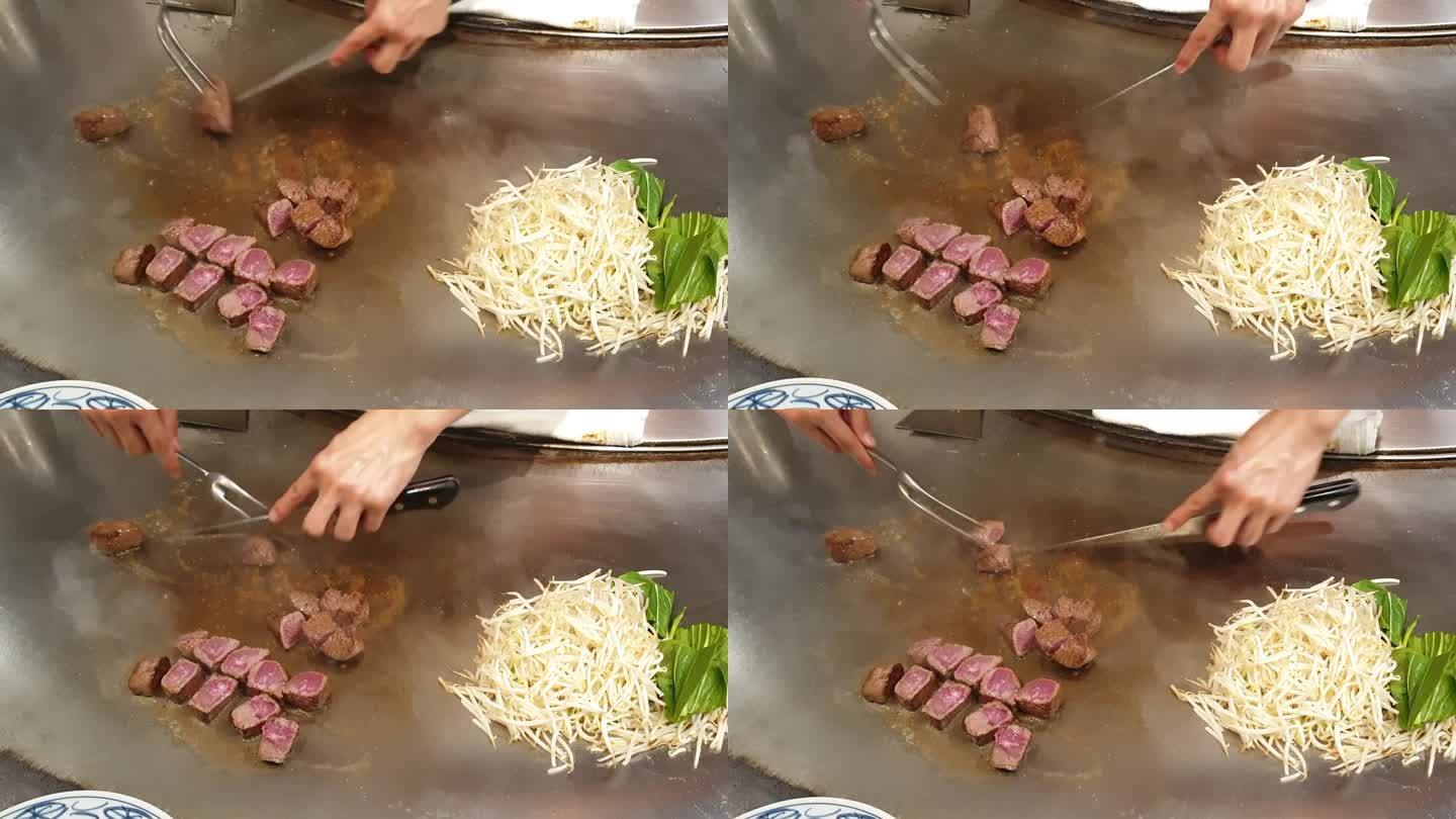 厨师烹饪和牛神户牛排铁板烧金属盘与蔬菜4k