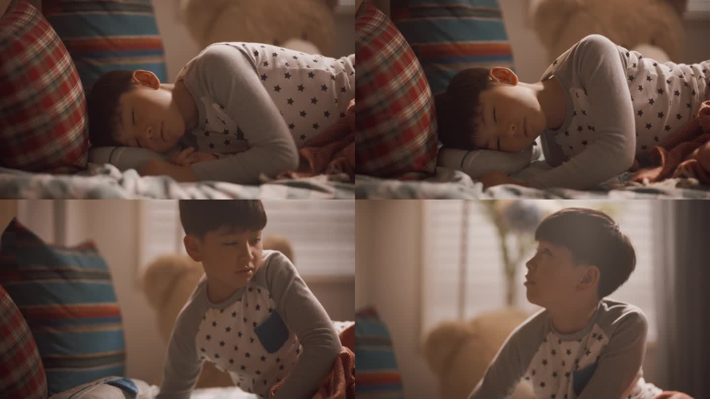 一个可爱的韩国小男孩在他舒适的房间里睡了一觉后醒来的照片。可爱的年轻亚洲孩子仍然困，环顾明亮的房间与