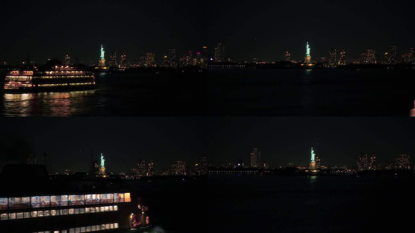 自由女神像周围的空中飞行。直升机拍摄的美丽夜色下的爱国纪念碑。带着灯光的渡船载着游客往返于曼哈顿