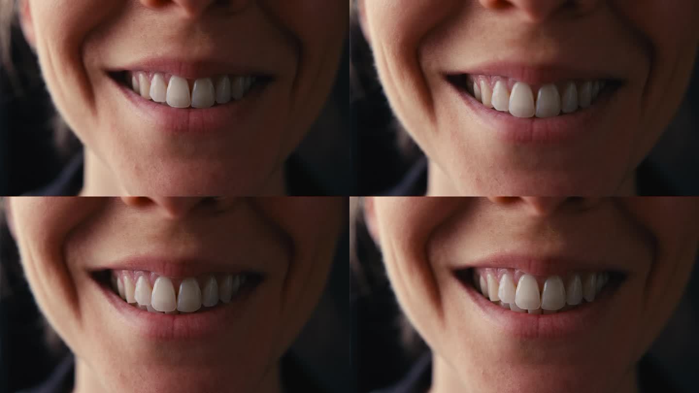 微距工作室拍摄的女人微笑与嘴唇和牙齿的特写